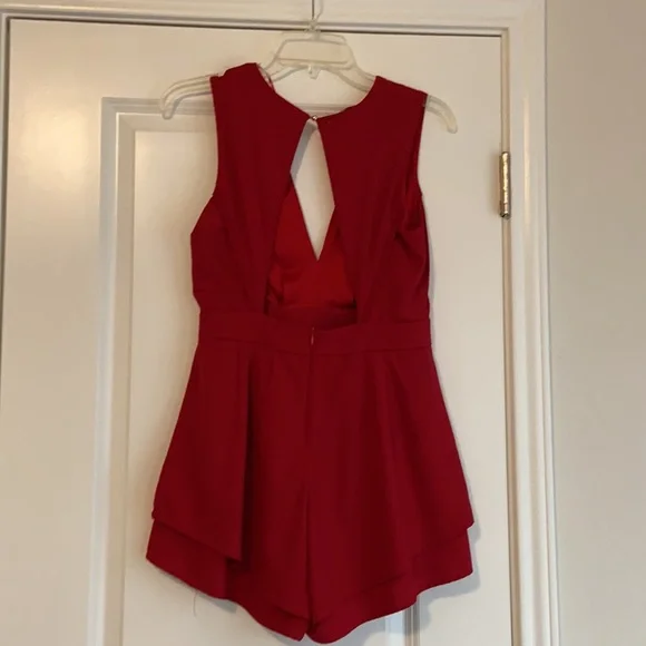 Red jumpsuit Romper. Pleated front. Open back. Size medium. Brand A’gaci - Picture 4 of 5
